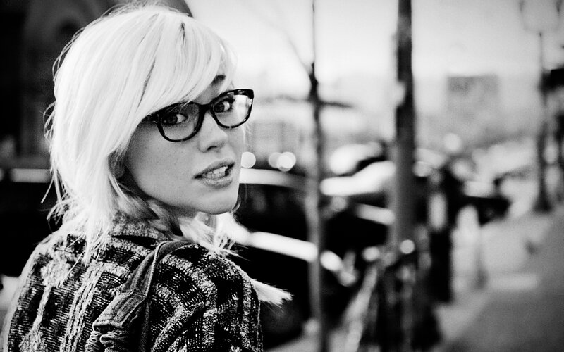 woman with glasses on street