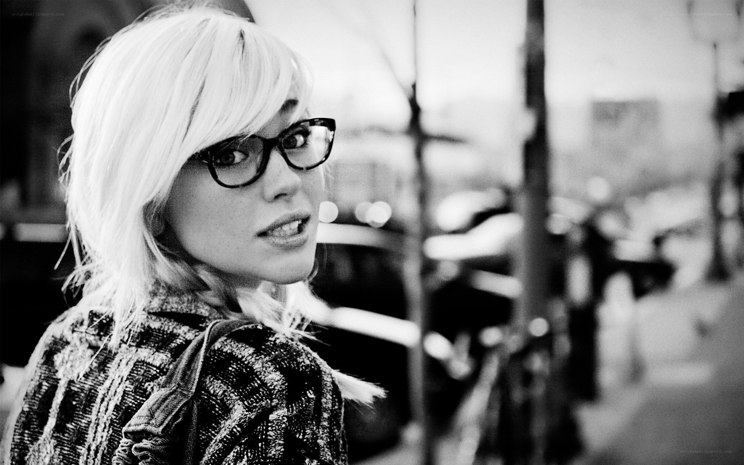 woman with glasses on street