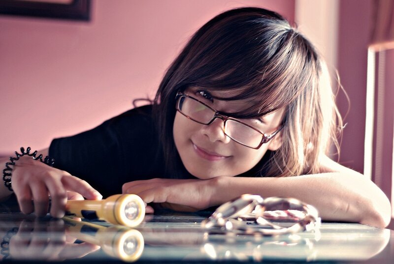 Woman with Glasses on Table