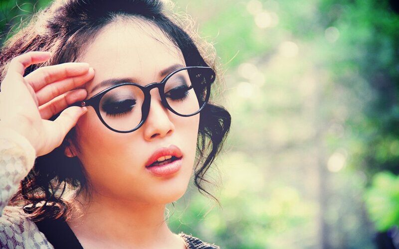 woman with glasses outdoors