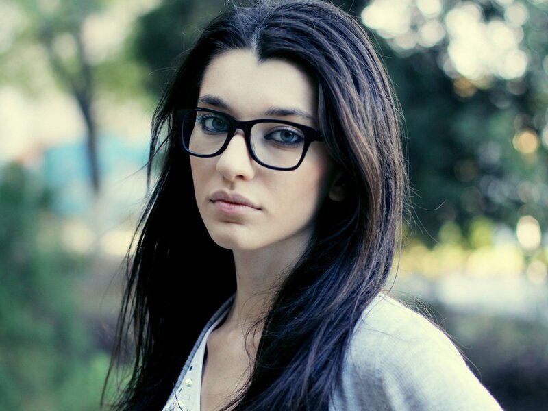 woman with glasses outdoors