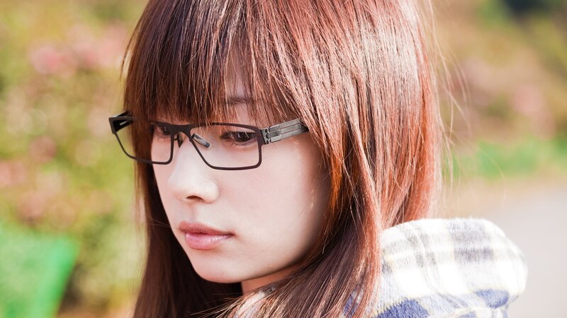 woman with glasses outdoors