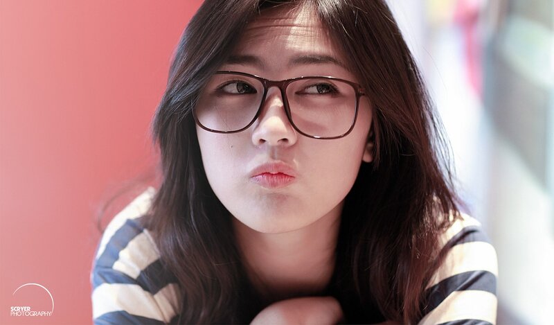 Woman with Glasses — Red, Neutral, Photograph