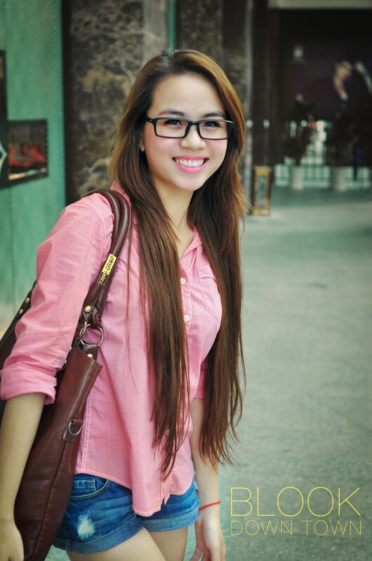 Woman with Glasses Smiling — Pink