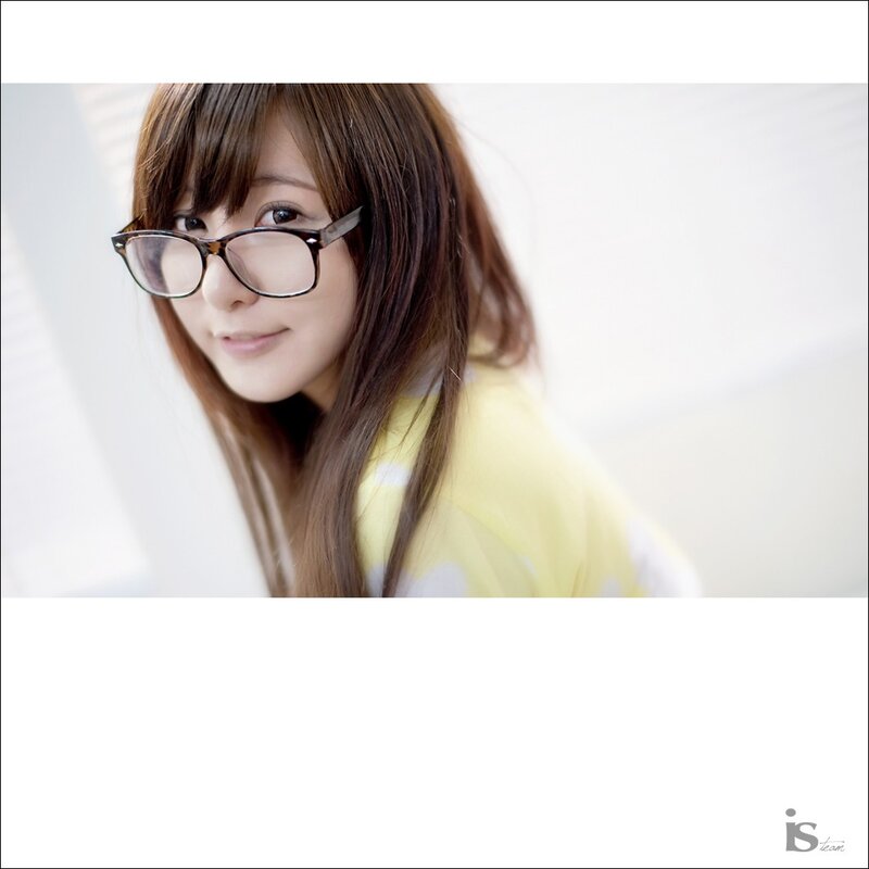 Woman with Glasses — White, Calm, Photograph