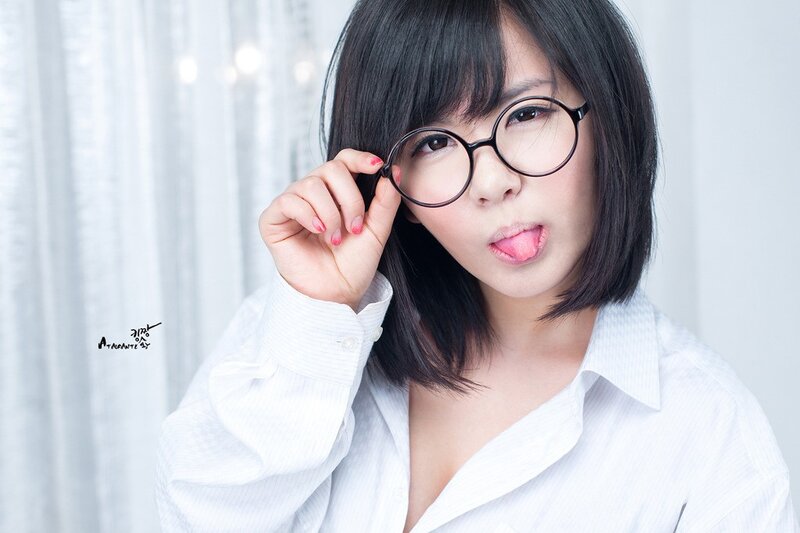 Woman with Glasses — White, Playful