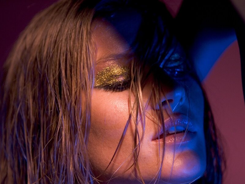 woman with glitter makeup