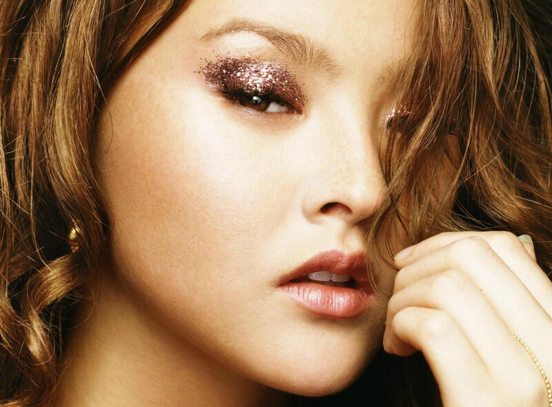 Woman with Glitter Makeup — Brown