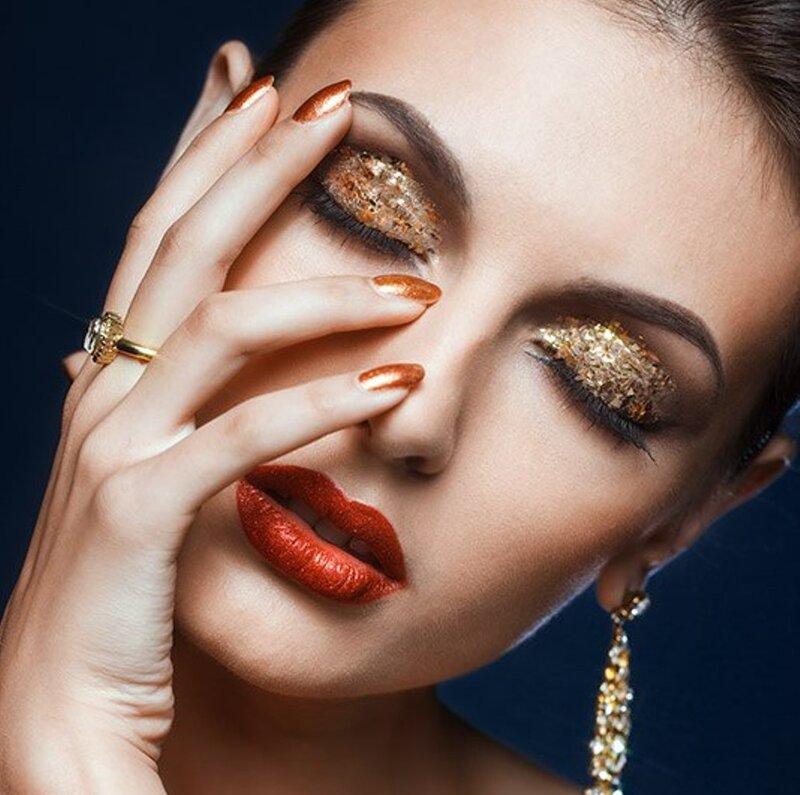 Woman with Glitter Makeup — Gold