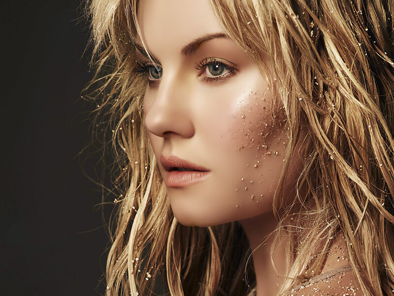 Woman with Glitter on Face — Gold