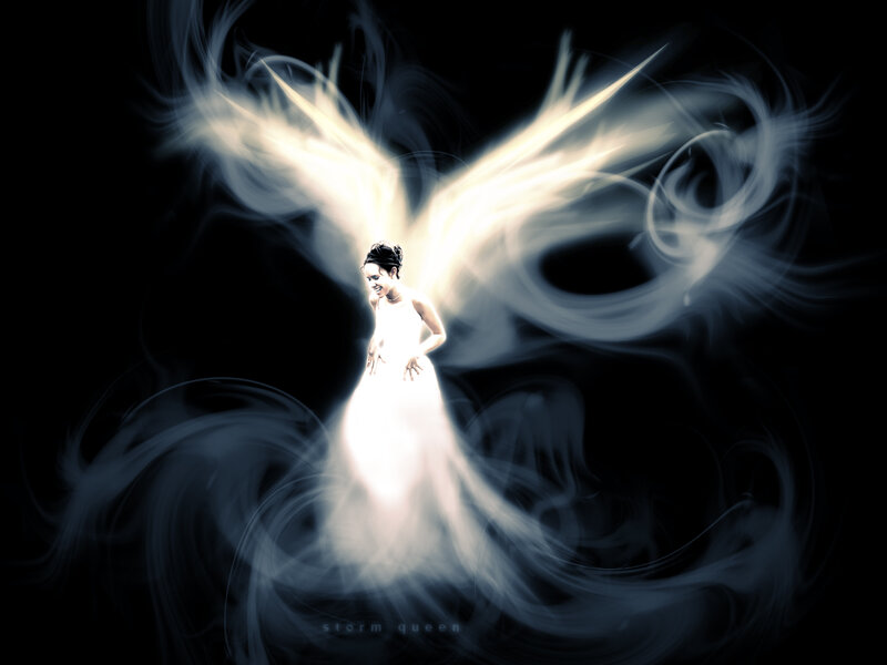 woman with glowing angel wings