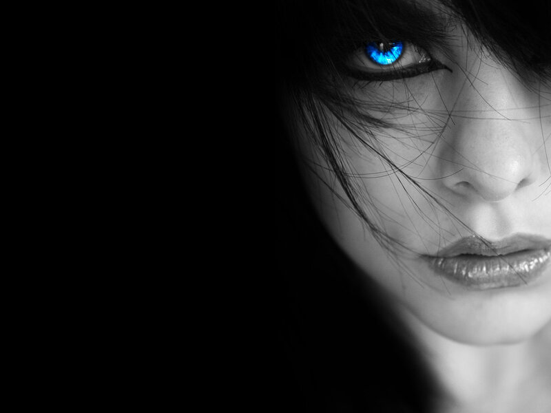 woman with glowing blue eye