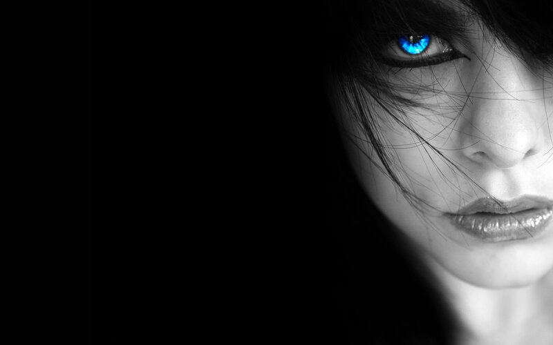woman with glowing blue eye