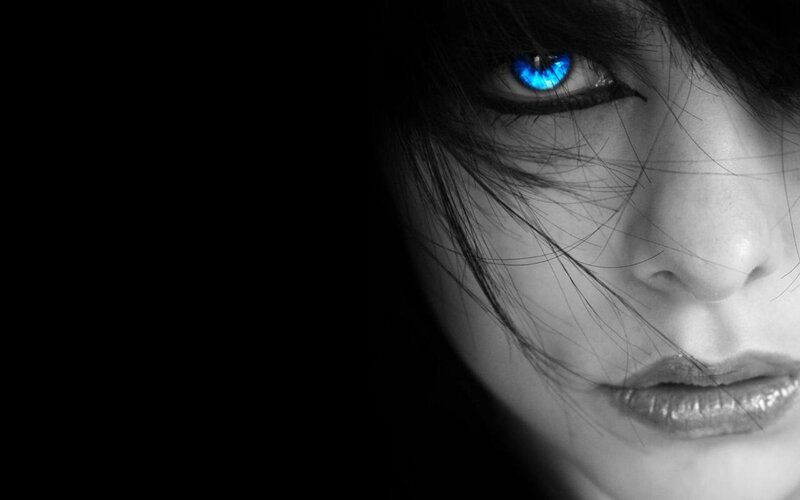 Woman with Glowing Blue Eye — Black