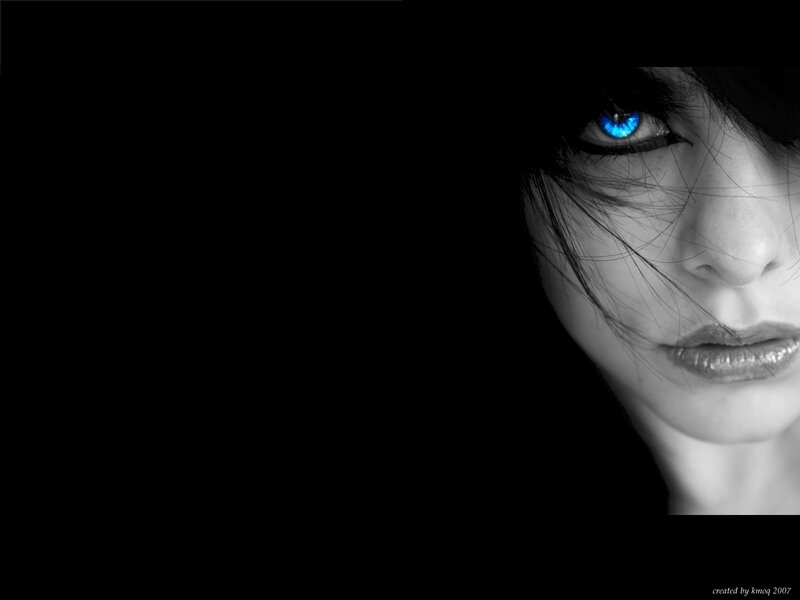 woman with glowing blue eyes