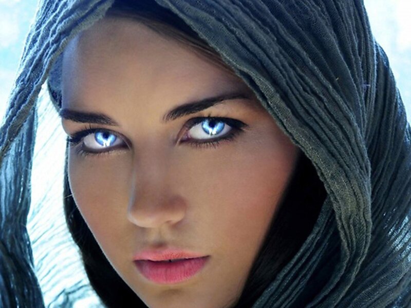 woman with glowing blue eyes