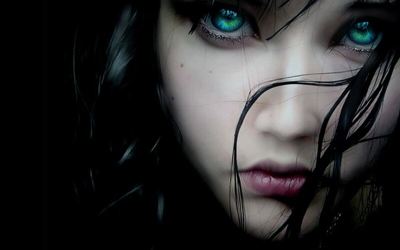woman with glowing blue eyes