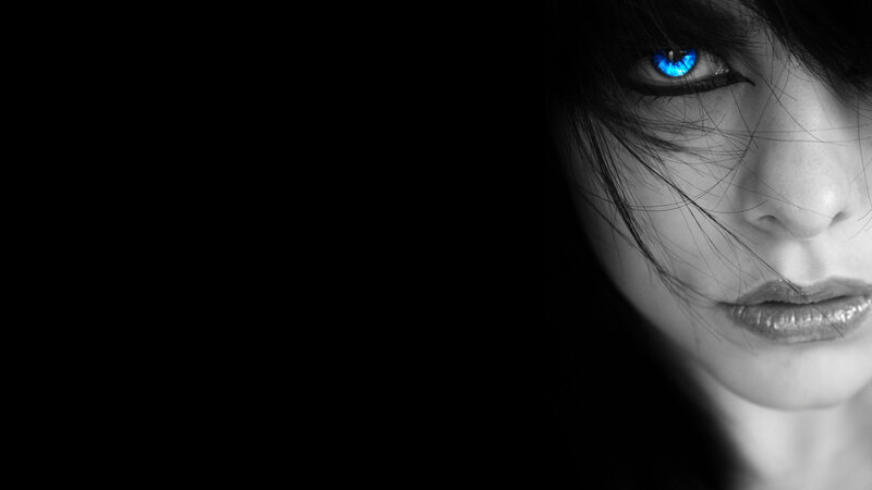 woman with glowing blue eyes