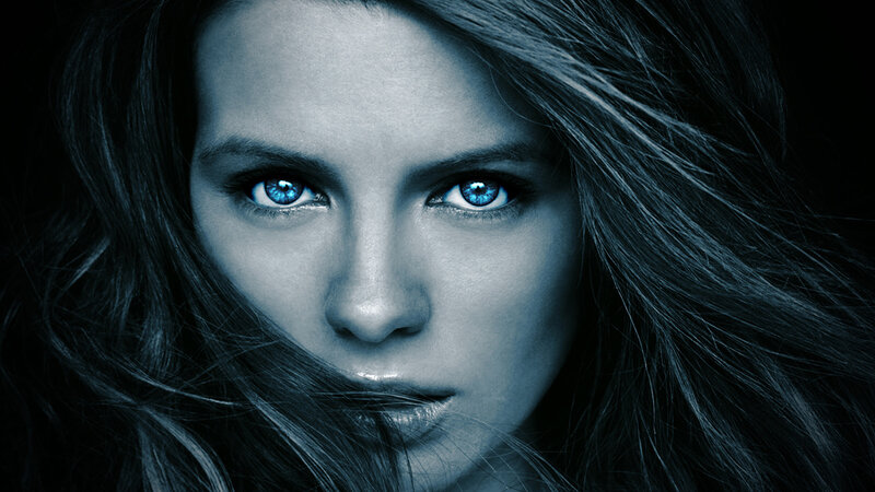 woman with glowing blue eyes