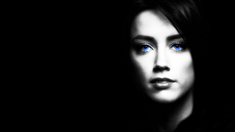 woman with glowing blue eyes