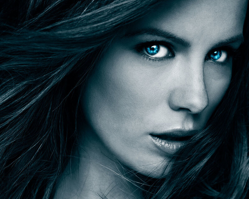 woman with glowing blue eyes