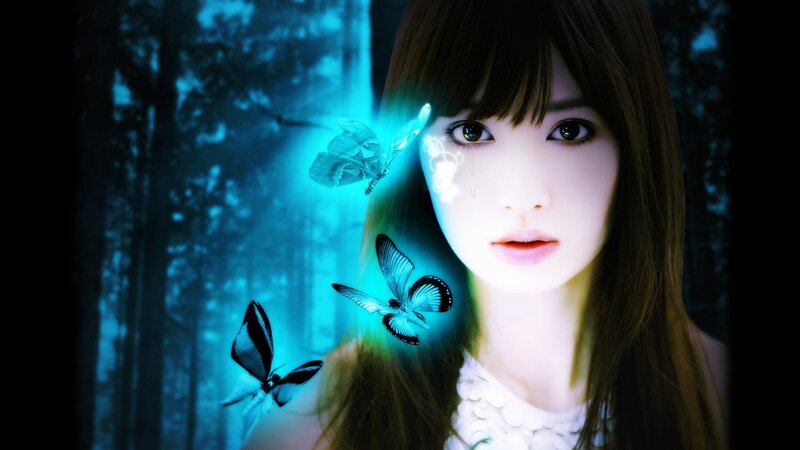woman with glowing butterflies