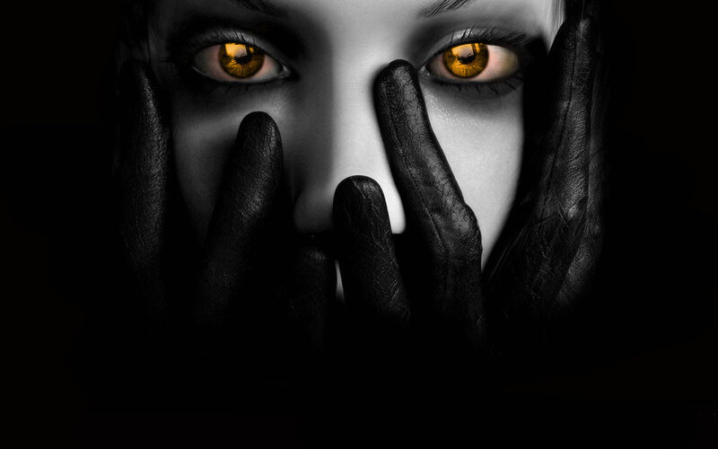 woman with glowing eyes