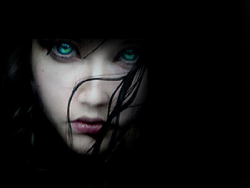 woman with glowing eyes