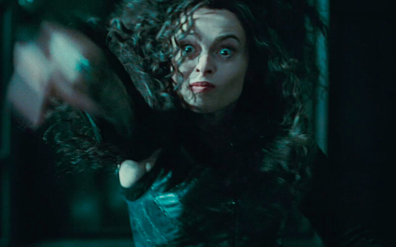 woman with glowing eyes in dark scene