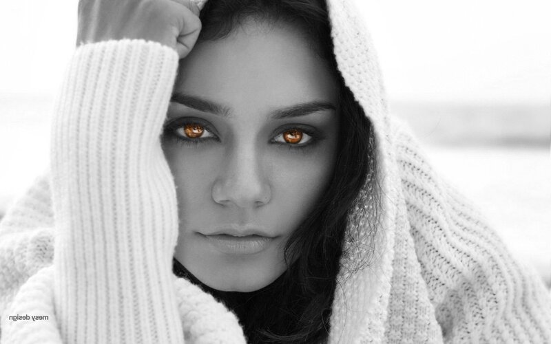 woman with glowing eyes in sweater