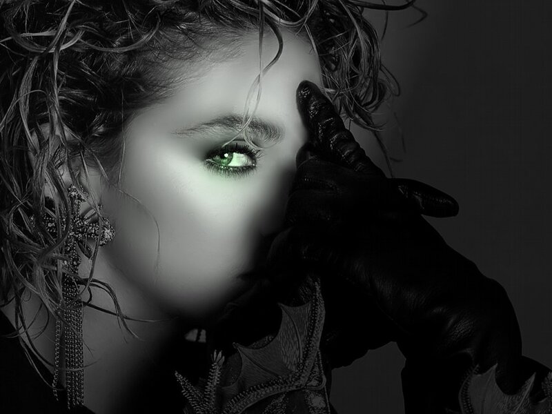 woman with glowing green eye