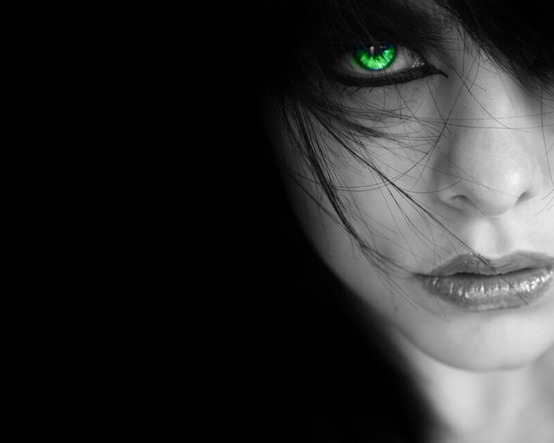 woman with glowing green eye