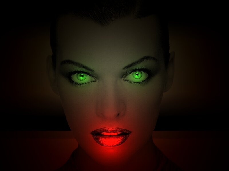 woman with glowing green eyes