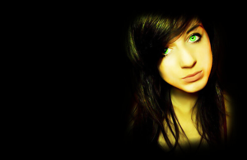 woman with glowing green eyes