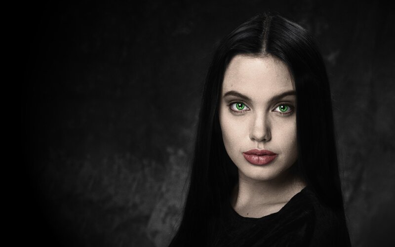 woman with glowing green eyes