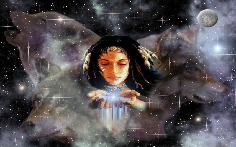 woman with glowing hands in space
