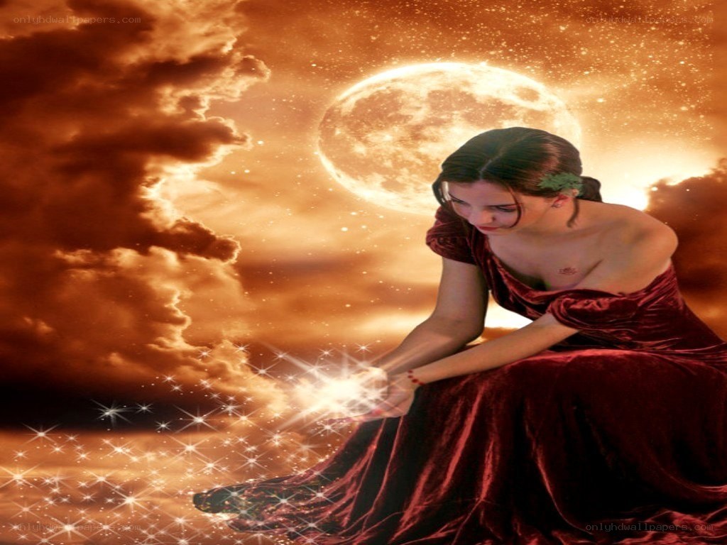 woman with glowing hands under moon