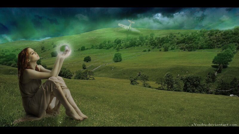 woman with glowing orb in field