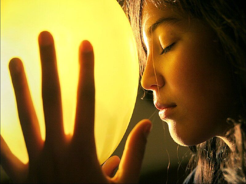 Woman with Glowing Orb — Yellow