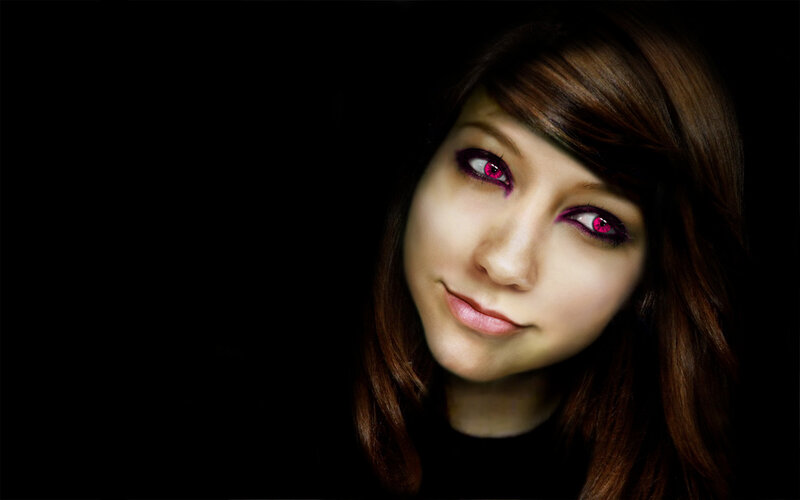 woman with glowing pink eyes