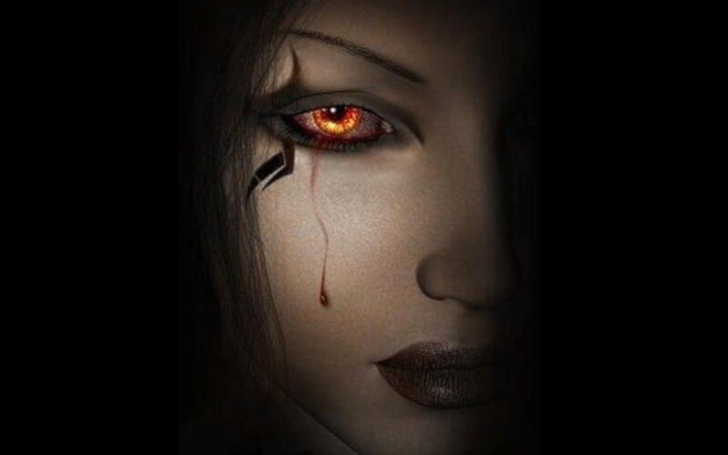 woman with glowing red eye