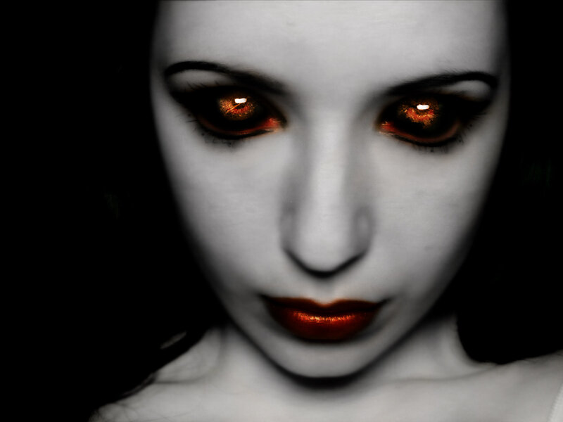 woman with glowing red eyes