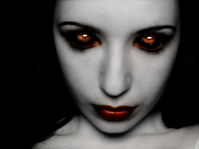 woman with glowing red eyes