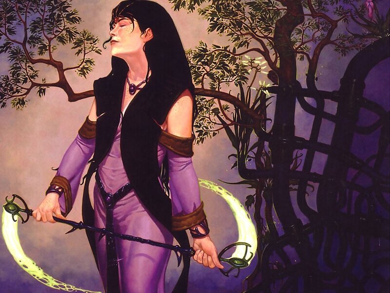 Woman with glowing staff in forest