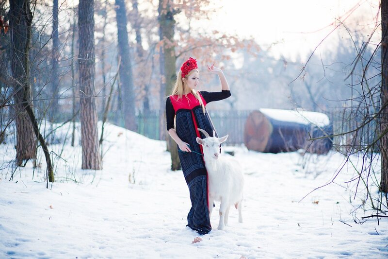 Woman with Goat in Snow