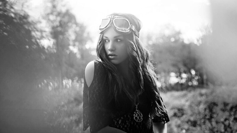 woman with goggles in nature
