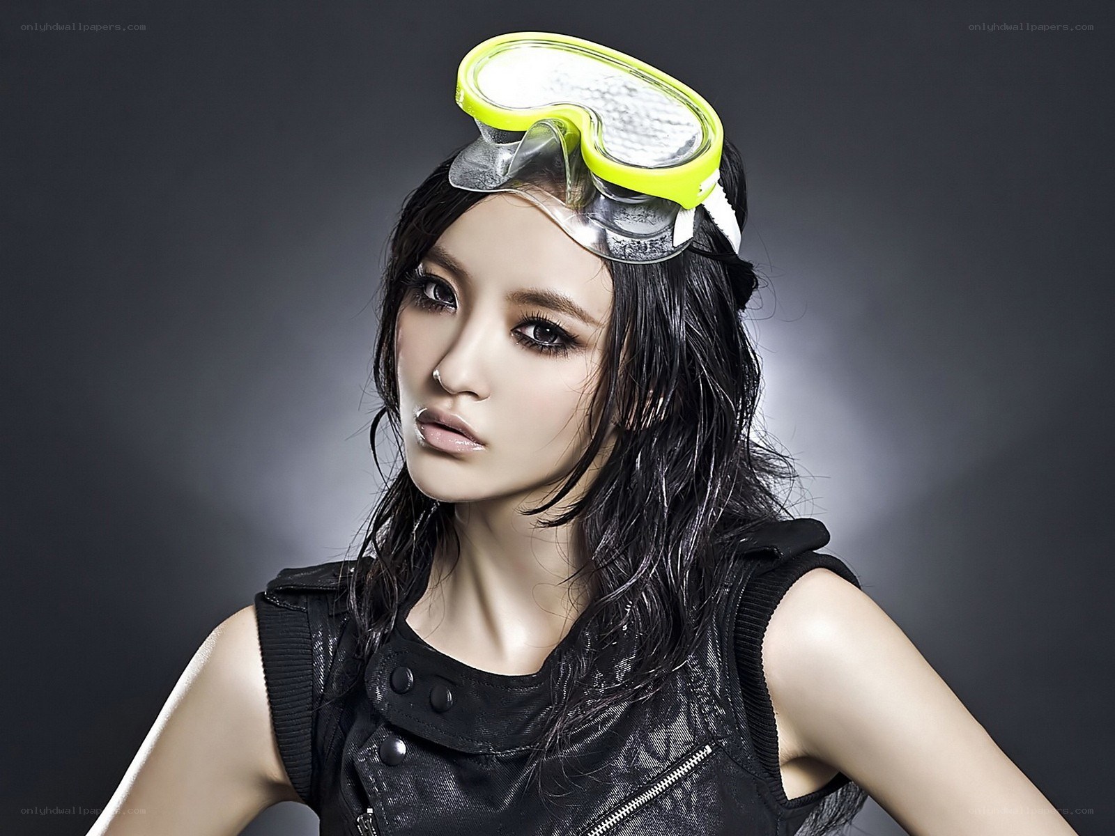 woman with goggles on head