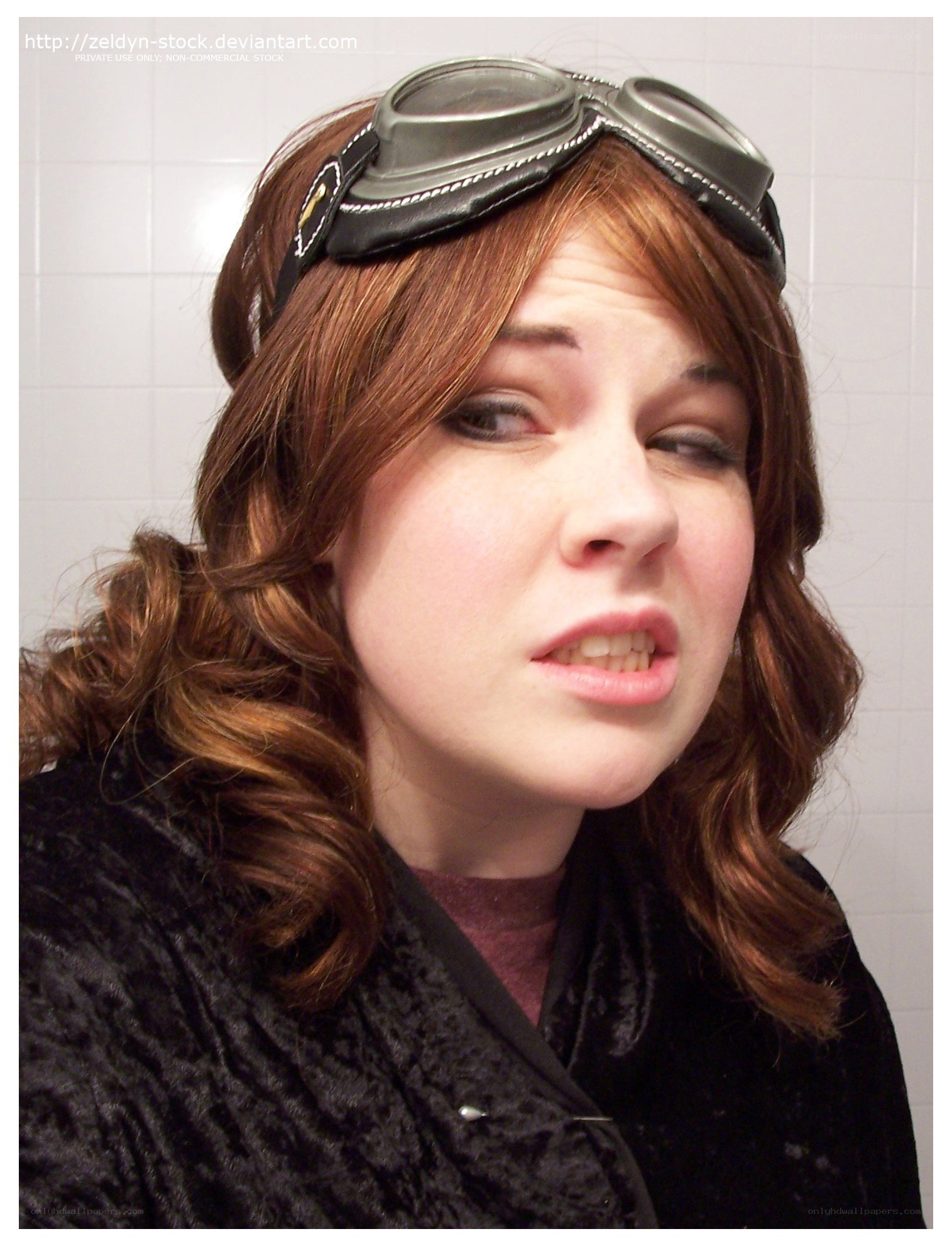 woman with goggles on head