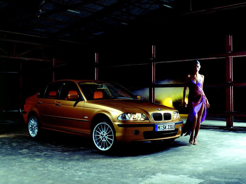 Woman with gold BMW car