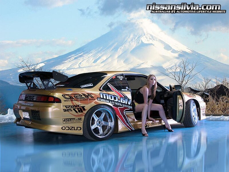 woman with gold car and mountain